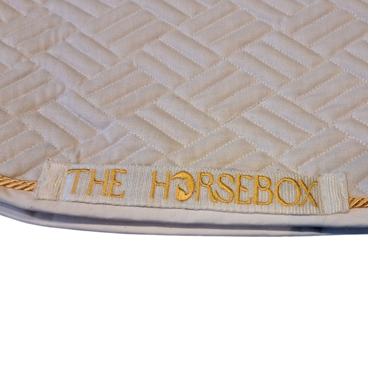 Zadeldekje van THE HORSEBOX met een stijlvolle afwerking in WHITE GOLD SAMPLE